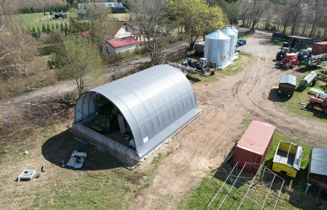 ARBENA building on a farm yard, aerial view