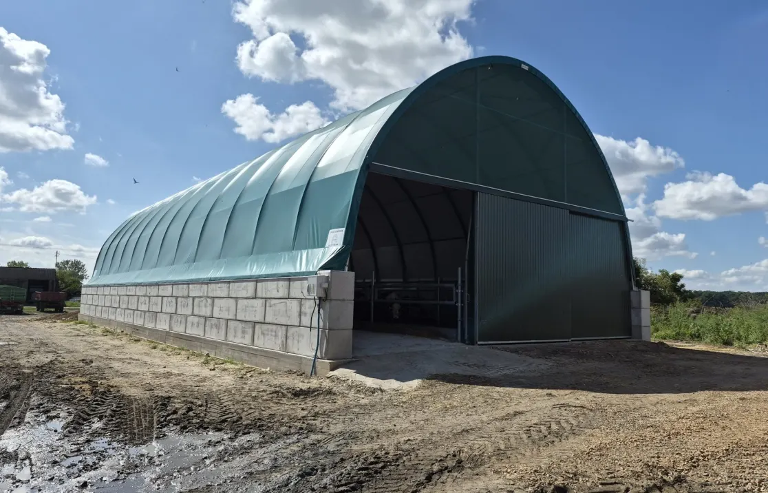 ARBENA farm building on concrete blocks with a closed gable